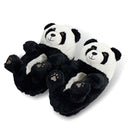 Pair of panda-shaped slippers on a white background