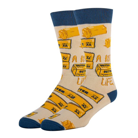 Beige socks with yellow 'Butter in a Life' design and blue cuffs and toes on a white background